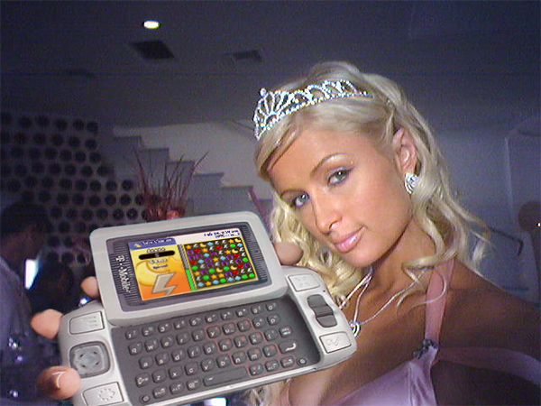 Poorly Photoshopped Photo of Paris Hilton playing Tiny Charms